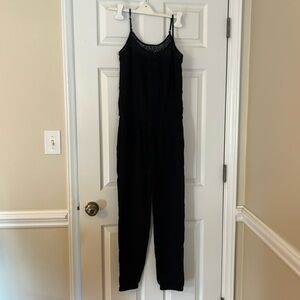 Gap size small black jumpsuit. Drawstring waist adjustable straps.